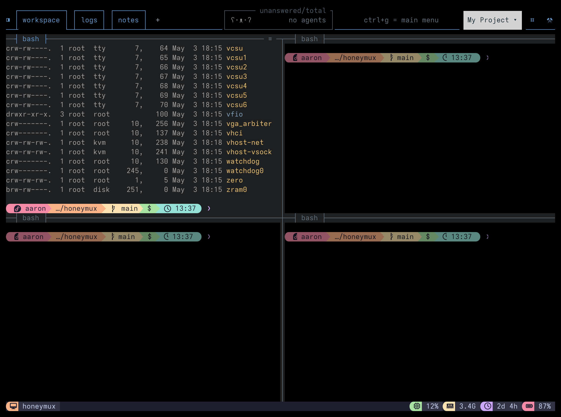 Four tmux panes in a 2x2 grid, with the upper-left pane at full brightness and the other three visibly dimmed